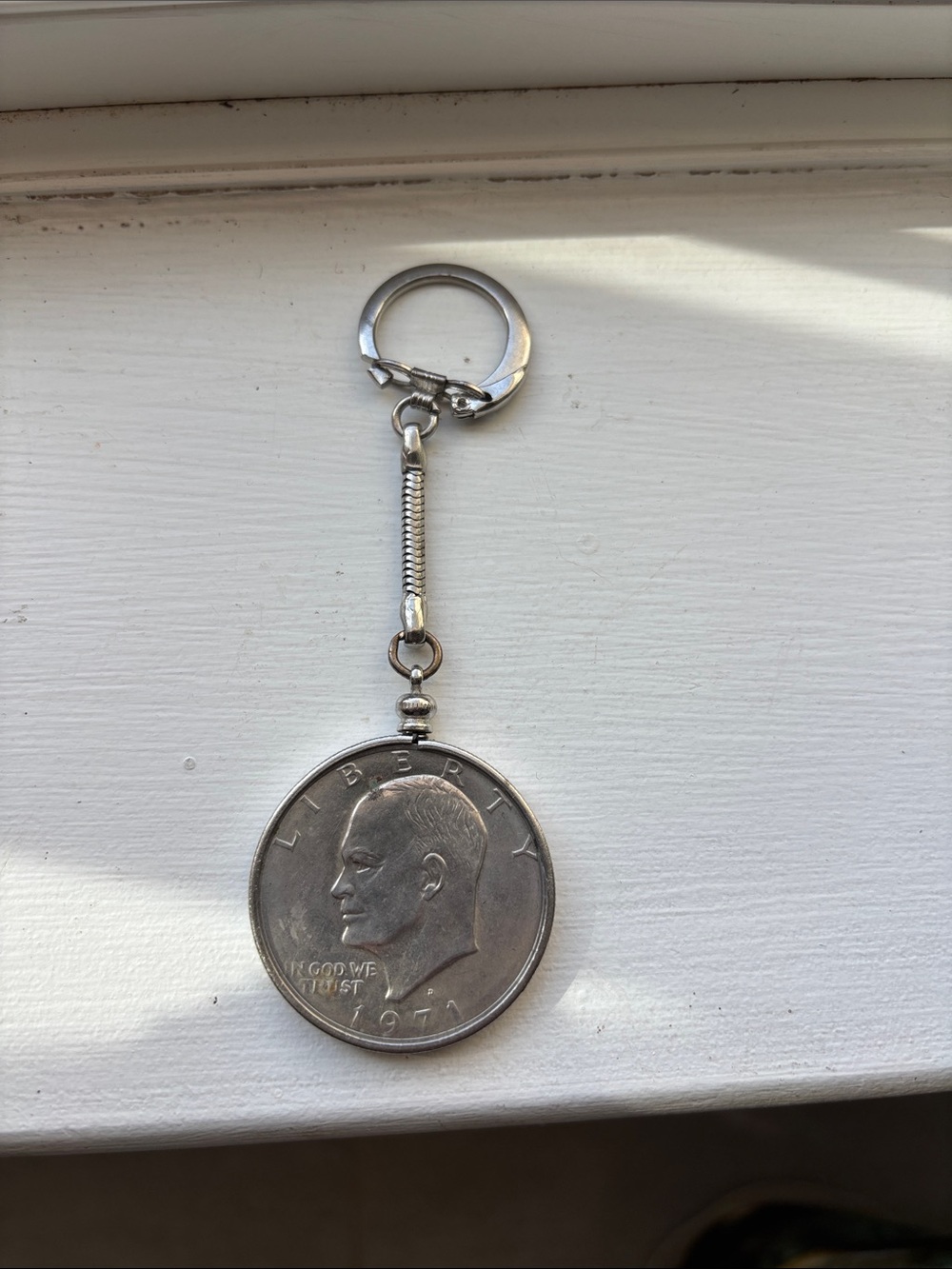 Collectible 1971 Eisenhower minted silver dollar on spinning keychain